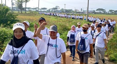 HUT ke-25 Kementrian BUMN, SIG Ajak Masyarakat Jalan Sehat di 14 Kabupaten/Kota